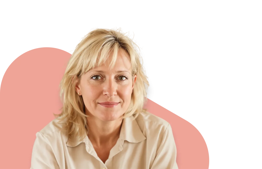 Middle-aged blonde woman smiling confidently, representing menopausal hormone therapy (MHT) treatment options