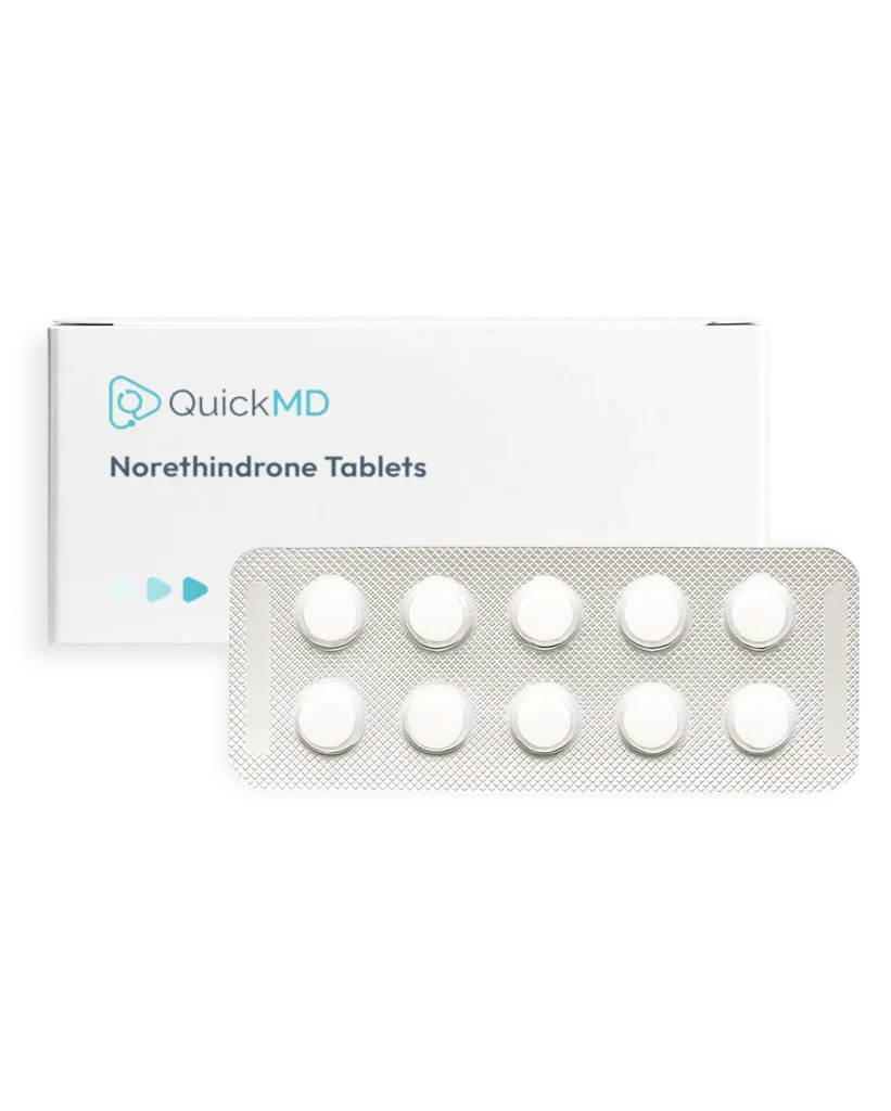 QuickMD Norethindrone Tablets box with a silver blister pack containing 10 white round pills