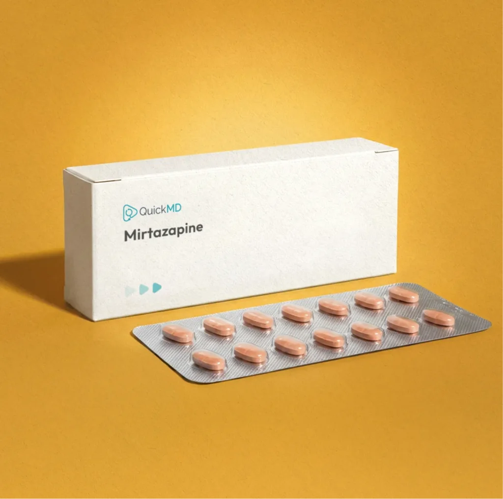 QuickMD Mirtazapine medication box with a blister pack of pink oval tablets on a yellow background