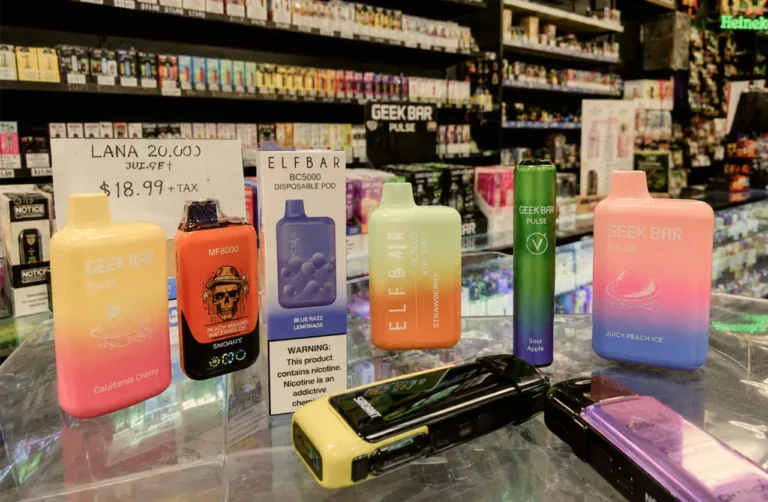 Vaping products on a counter at a store that sells nicotine products.