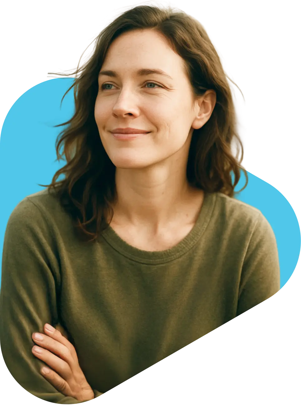 Smiling woman with brown wavy hair in olive green top receiving 7-OH and kratom treatment consultation