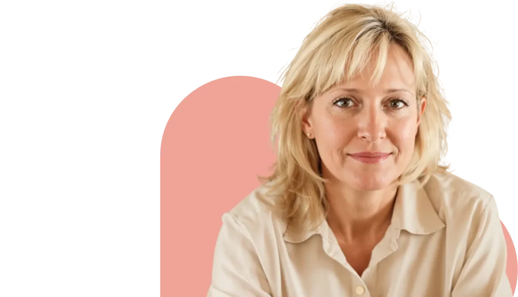 Middle aged blonde woman smiling