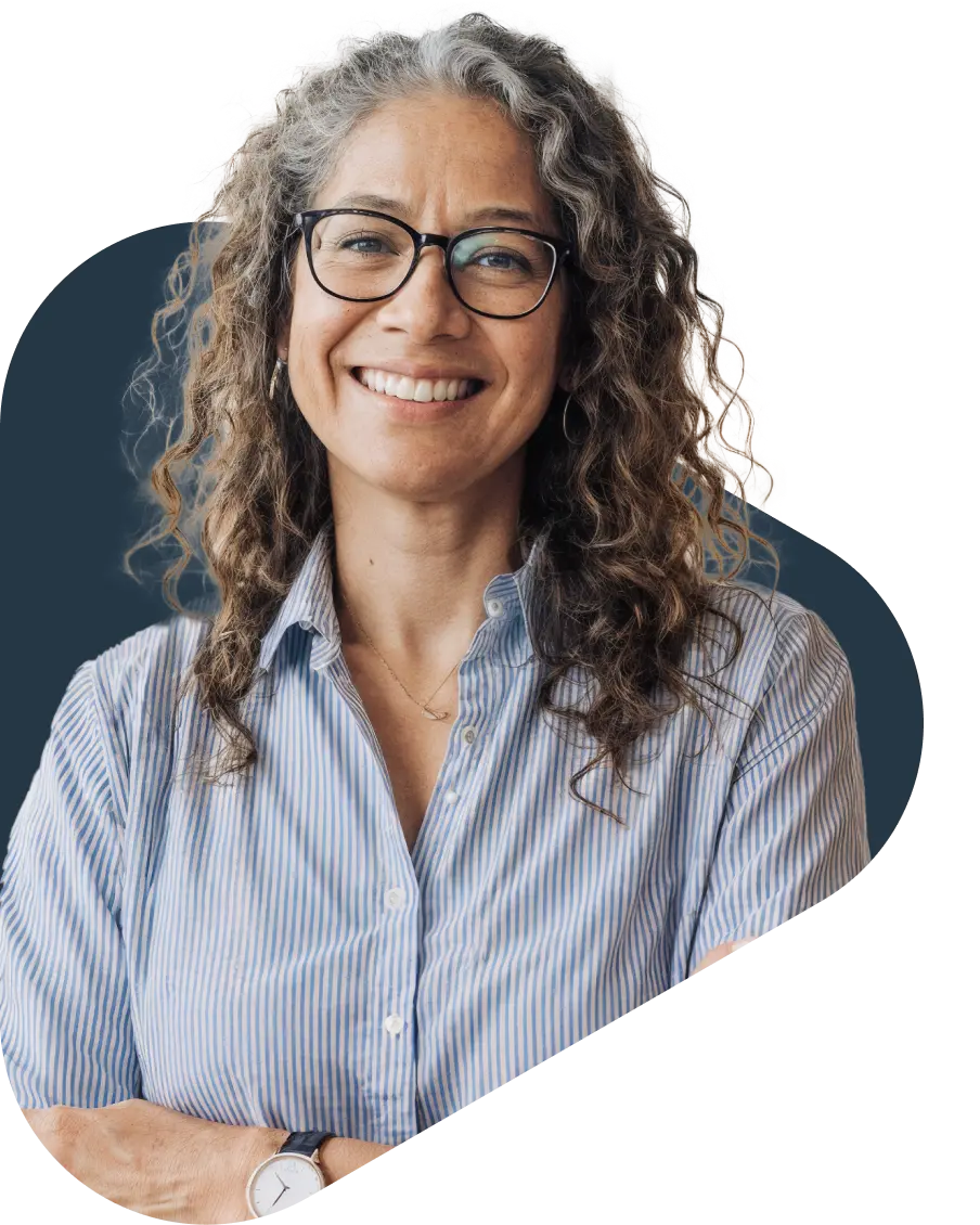 Woman with curly hair and glasses
