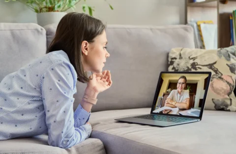 woman-on-lapto-speaking-with-a-counselor